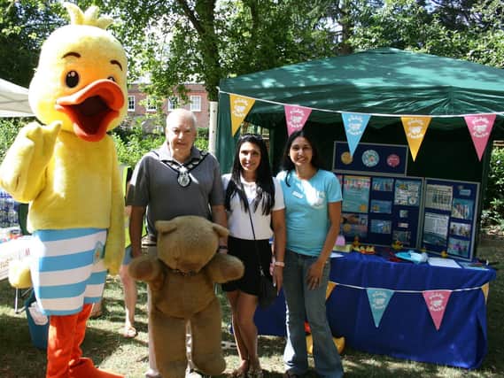 L to R: Puddle the Duck, Mayor of Harpenden David Heritage, Ravneet Bermi and Parveen Gilman, Puddle Ducks office manager.