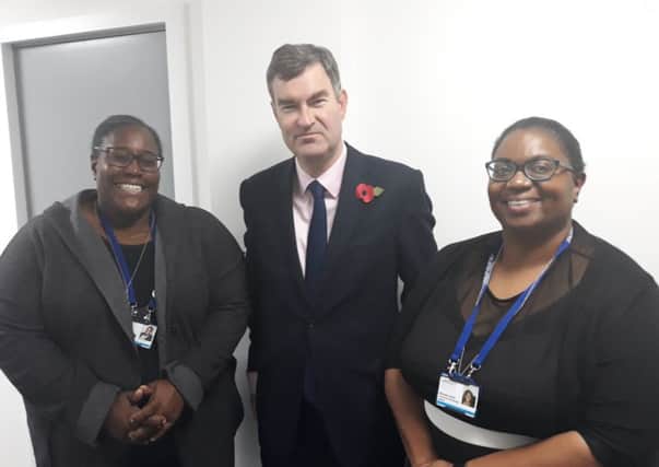 (left to right) Manager Michelle Gale, David Gauke and Winsome Small, interim corporate operations director