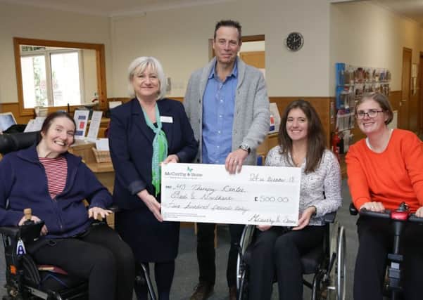 Donation: from left are Louisa Moreton, Sue Harbourne, sales executive, JP Brown, Kay Taylor, chair of trustees MS Therapy Centre and Tammy Cooper.
