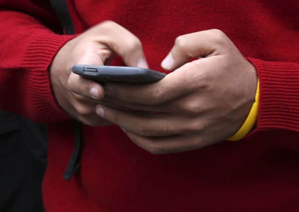 Rape victims are being told to hand over their phones to police. Picture: Philip Toscano/PA Wire