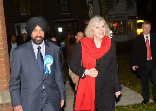 Theresa May visiting Bedford to show support for Jas Parmar in 2012 when he was standing for election as police and crime commissioner