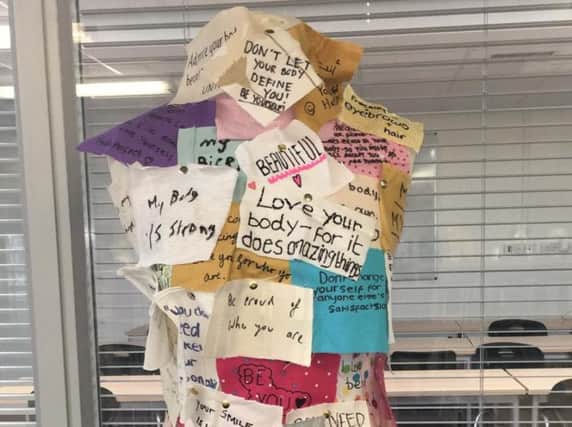 The mannequin of messages from the students has been turned into clothes that will go on display at the fashion show