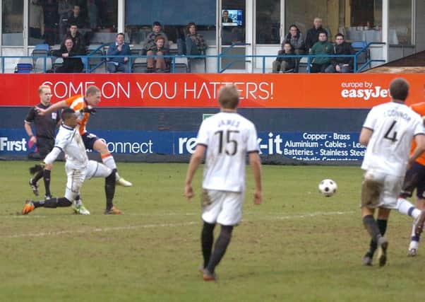 Dave Martin fires home Town's leveller against Hereford on Saturday. Pic: Jo Cross.