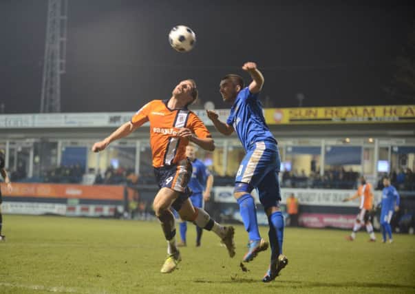 Jon Shaw challenges for a header on Tuesday night