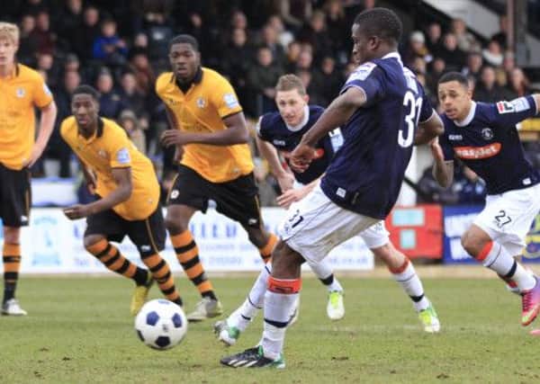 Solomon Taiwo has signed a new one-year deal at Kenilworth Road