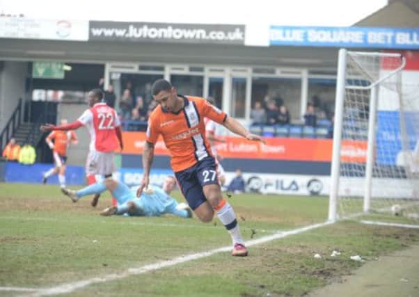 Andre Gray wheels away after scoring his 15th of the season on Saturday