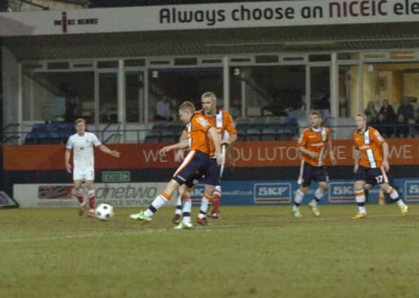 David Martin fires home Town's opening goal this evening. Pic: Joanna Cross