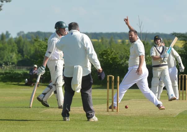 MBTC-27-05-13-  County Cricket Bedfordshire v Cornwall. Cople Cricket Club.  Bedfordshire batsman Alex Walker bowled out.