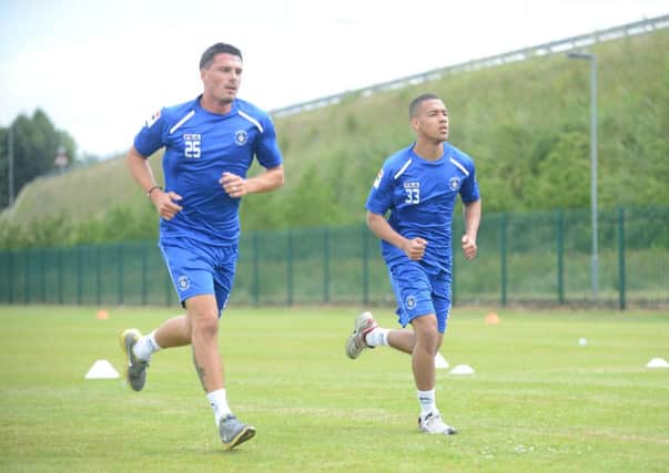 Jerome Jibodu in pre-season training with Ronnie Henry