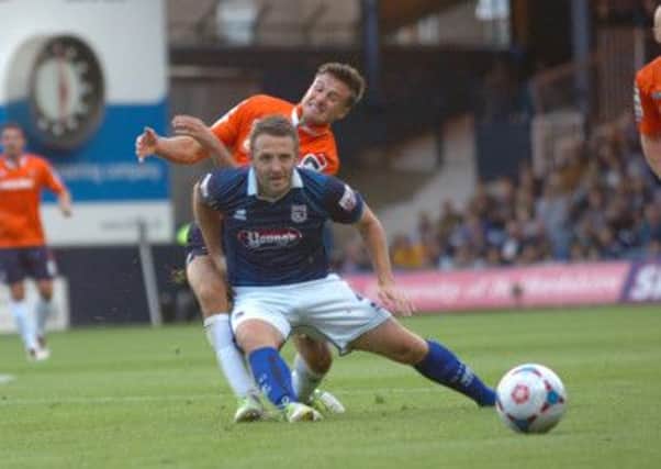 Jonathan Smith makes a challenge during Saturday's 0-0 draw with Grimsby