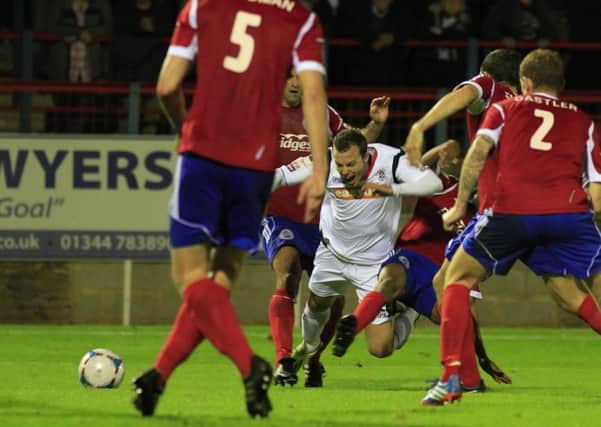 Shaun Whalley is brought down for Town's penalty on Tuesday night