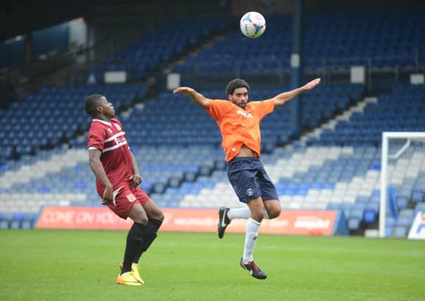 Anthony Charles clears the danger for Luton this afternoon