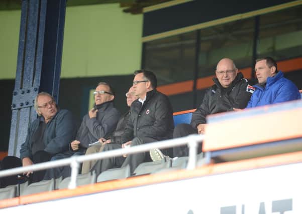 Hatters boss John Still watches on with Northampton boss Aidy Boothroyd