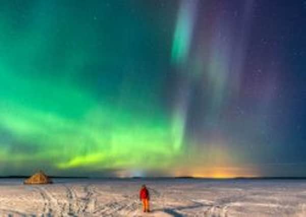 Northern Lights display over the frozen Baltic Sea in Lulea, Sweden. Picture: PA Photo/Renato Granieri.