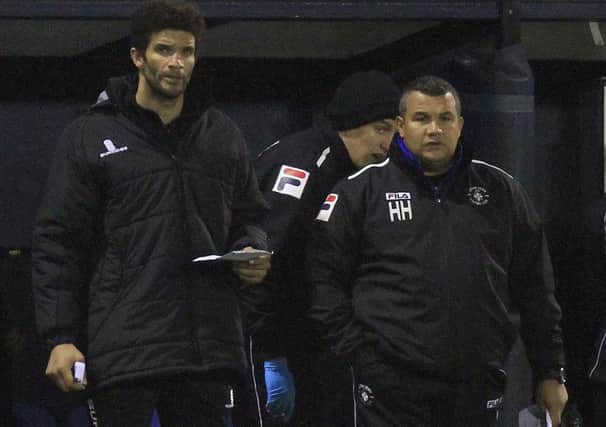 Hakan Hayrettin and David James look on during Town's 2-1 win over West Ham