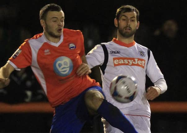 Alex Lawless challenges former Town defender Newman Carney