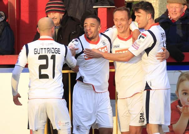 Town players celebrate at Alfreton on Saturday