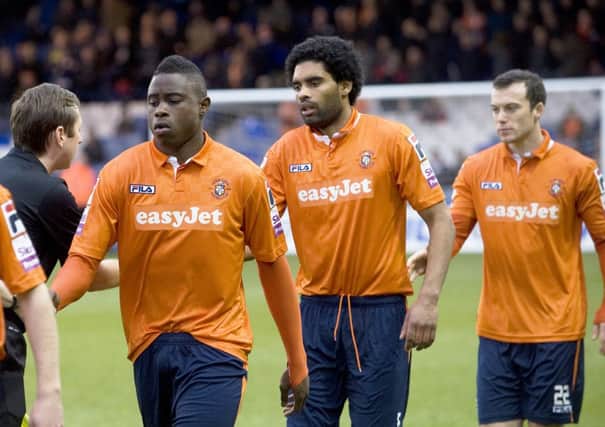 Anthony Charles, middle, lines up for Luton