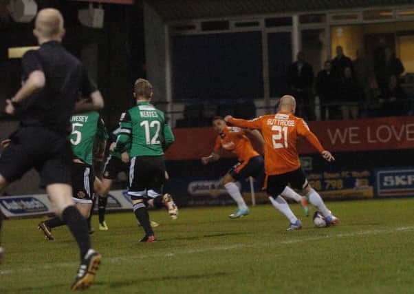 Luke Guttridge nets Town's opening goal against Wrexham