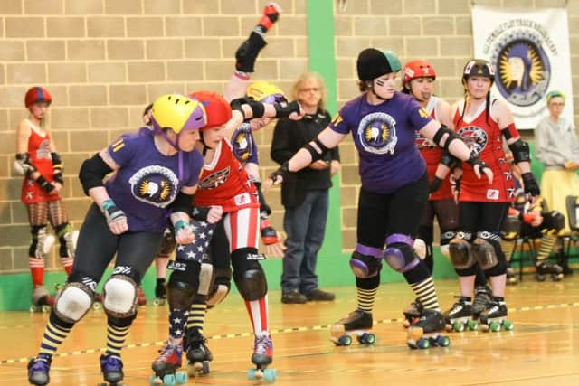 BRG (purple) play the Norfolk Brawds    MDP Images
