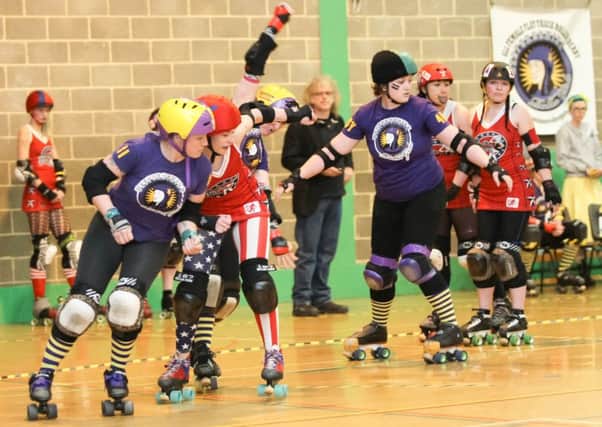 BRG (purple) play the Norfolk Brawds    MDP Images