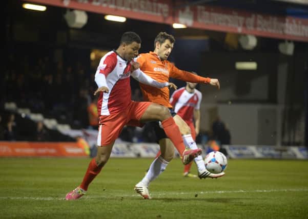Alex Lawless in action against Woking