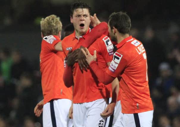 Matt Robinson celebrates equalising for Town at Grimsby