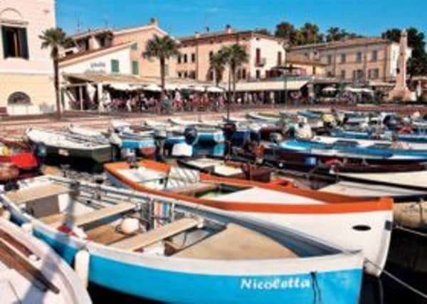 A view of the harbour in Bardolino on Lake Garda. Picture: PA Photo.
