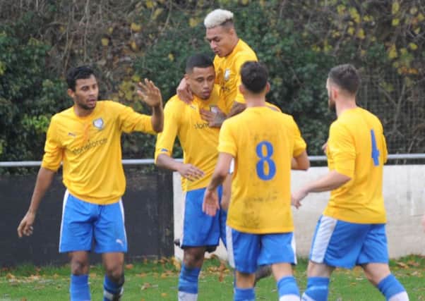 The Berkhamsted players celebrate