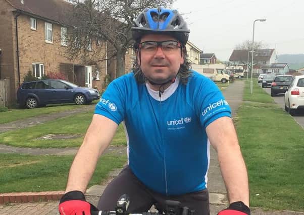 Tim Davies, from Clapham, to take on cycle trek for UNICEF.