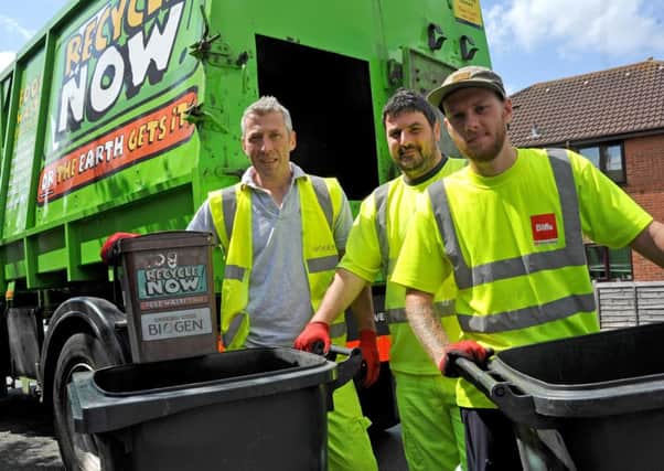 Biogen boss Julian O'Neill gets his hands dirty collecting bins.