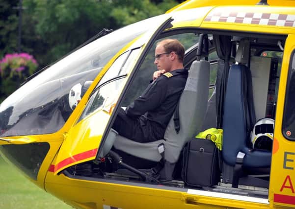 Prince William in his East Anglian Air Ambulance