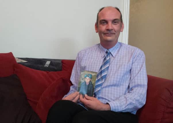 Craig Langman, chairman of the 'Parents Want A Say' campaign at his Nuneaton home. PRESS ASSOCIATION Photo. Issue date: Wednesday October 21, 2015. The camoaign is against parents being fined for taking their children out of school in term time even in exceptional circumstances dictated by illness or bereavement. Mr Langman started a petition two years ago which now has well over 200,000 signatures. See PA story EDUCATION Fines. Photo credit should read: Phil Barnett/PA Wire