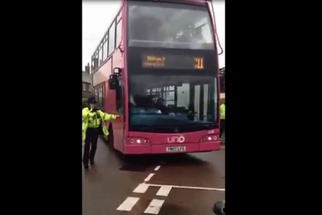 Bus driver angers crowd after interrupting Remembrance service VIDEO: JAMES VINCENT FACEBOOK
