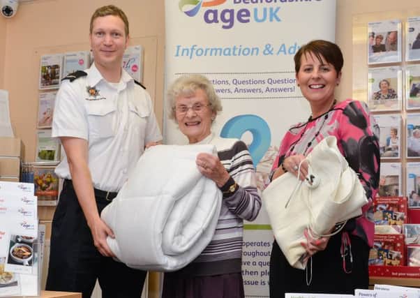 Bedfordshire Fire and Rescue Service is swapping old electric blankets for new, with Age UK PNL-151011-102430001