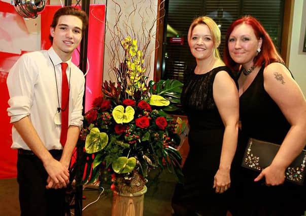 CEO of World Youth Organisation Kieran Goodwin and staff from Grey Court Florists, Bedford PNL-160113-131218001
