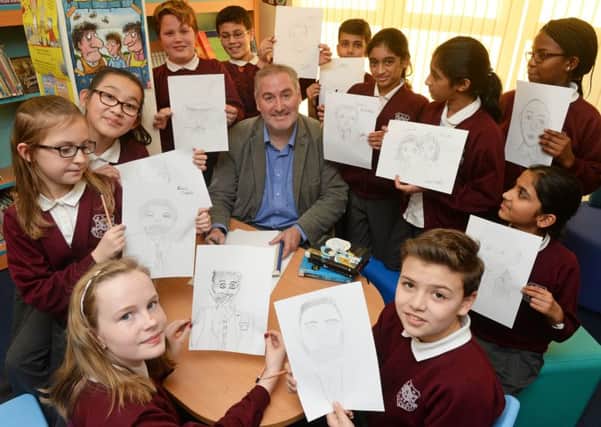Childrens Laureate Chris Riddell opens the new library at Caudwell School, Bedford PNL-160302-105509001