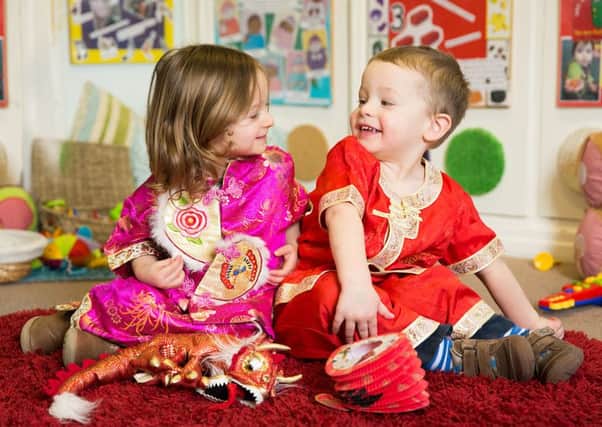 Eliza Hartley and Adam Webb celebrate Chinese New Year at Cherry Trees Day Nursery, Cranfield PNL-160902-101323001