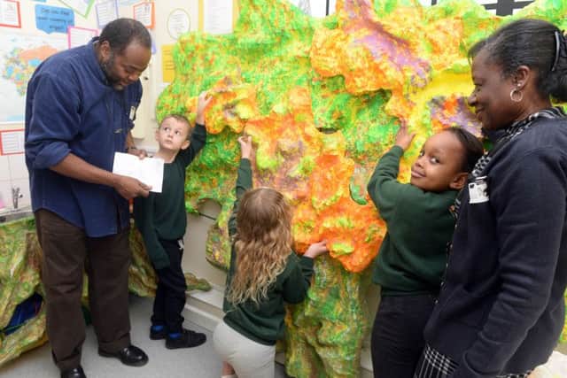 Pupils take part in an art workshop with Carl Gabriel during Goldington Academy Academy's multicultural week PNL-160902-125126001