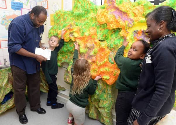 Pupils take part in an art workshop with Carl Gabriel during Goldington Academy Academy's multicultural week PNL-160902-125126001