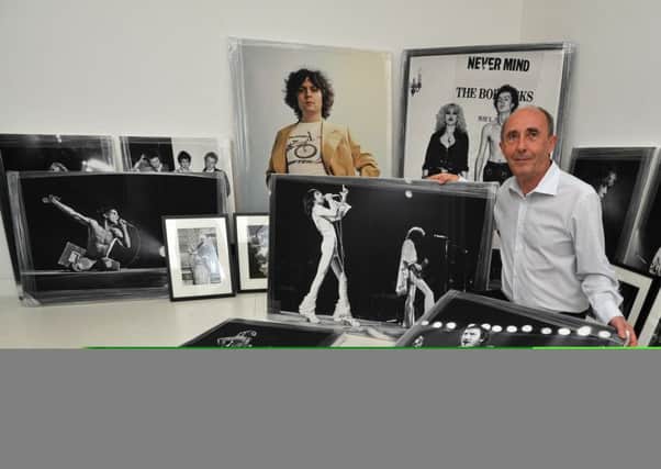 Steve Emberton pictured with some of his iconic images