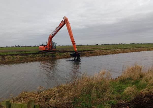 The Environment Agency is removing accumulated silts and sediments from the Old Bedford River at Salters Lode to reduce flood risk. PNL-160217-175200001