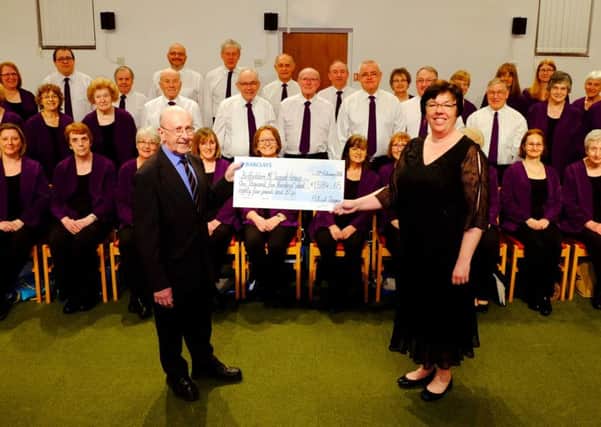 Flitwick Singers donate almost Â£1,600 to the Bedfordshire ME Support Group. This follows a series of fundraising concerts last year. PNL-160229-100435001