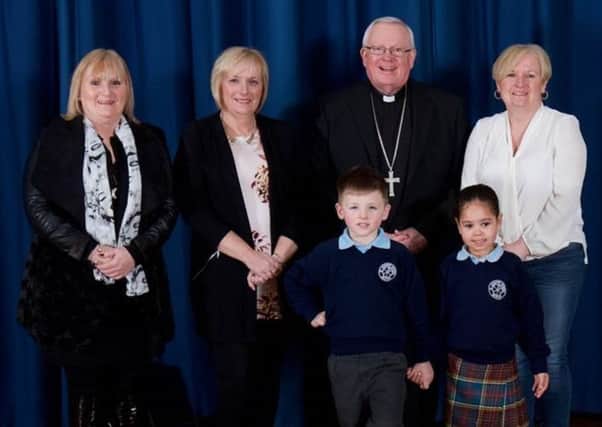 St Joseph School 50th anniversay - Bishop Peter with alumni and pupils.