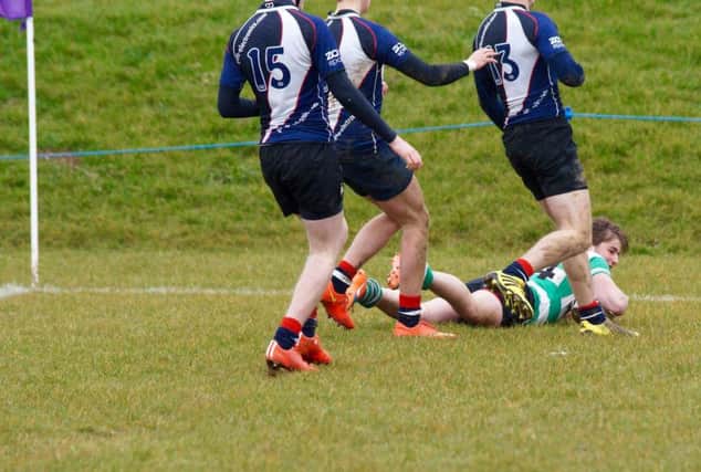Olly Bradford dives over for his first try