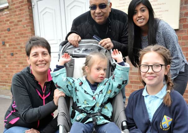 Piper Docherty with her Mum Rebekah, sister Meadow, Pastor Sardar Thapar and Hannah James from Bedford Christian Centre. PNL-160531-130442001