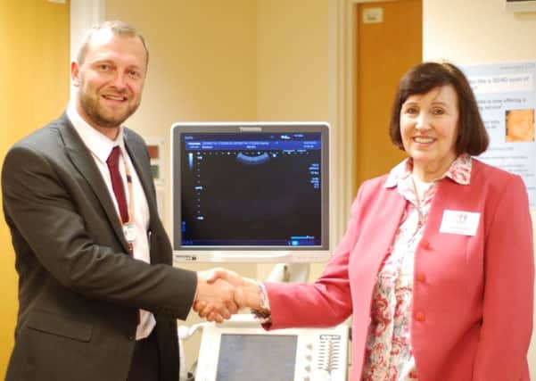 Christian Kasmeridis, radiology clinical service manager and Felicity Scott, chair of the Friends of Bedford Hospital charity at the opening of the new ultrasound scanner