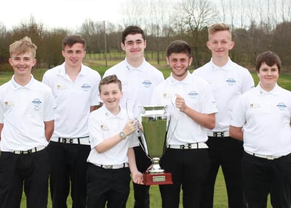 Junior Golf champions showing the trophy off back at Beadlow, from left, Lewis Vereecque,  Conner Penning, Ben Loveard, Will Murray, Luke Charalambous, Jamie Gibbons, Jack Munson. PNL-170222-153125002