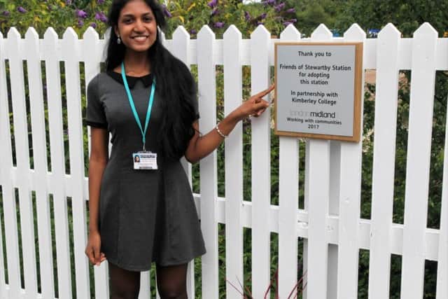 Sasirekha Valaiyapathi, Head Girl of Kimberley College, opens the new shelter.