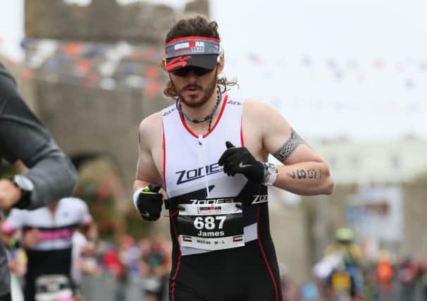 James Tobia competing in Ironman Wales.